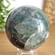 Fluorite stone in the shape of a ball with a diameter of 6.3 cm