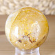 Crystal stone with limonite in the shape of a sphere with a diameter of 5.0 cm