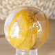 Crystal stone with limonite in the shape of a ball with a diameter of 5.8 cm