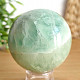 Fluorite stone in the shape of a ball with a diameter of 6.4 cm