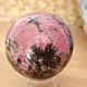 Rhodonite stone in the shape of a ball 390 grams