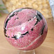 Rhodonite stone in the shape of a ball 668 grams