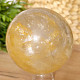 Crystal stone with limonite in the shape of a ball 1040 grams