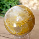 Crystal stone with limonite in the shape of a ball 248 grams