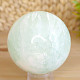 Pistachio calcite stone in the shape of a ball 473 grams