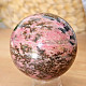 Rhodonite stone in the shape of a ball 440 grams