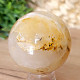 Crystal stone with limonite in the shape of a ball 311 grams