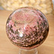 Rhodonite stone in the shape of a ball 440 grams