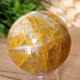 Crystal stone with limonite in the shape of a ball 248 grams