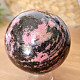 Rhodonite stone in the shape of a ball 570 grams