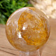 Crystal stone with limonite in the shape of a ball 312 grams