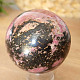 Rhodonite stone in the shape of a ball 483 grams