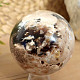 Dark opal stone in the shape of a ball 612 grams