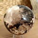 Dark opal stone in the shape of a ball 612 grams