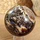 Dark opal stone in the shape of a sphere 430 grams